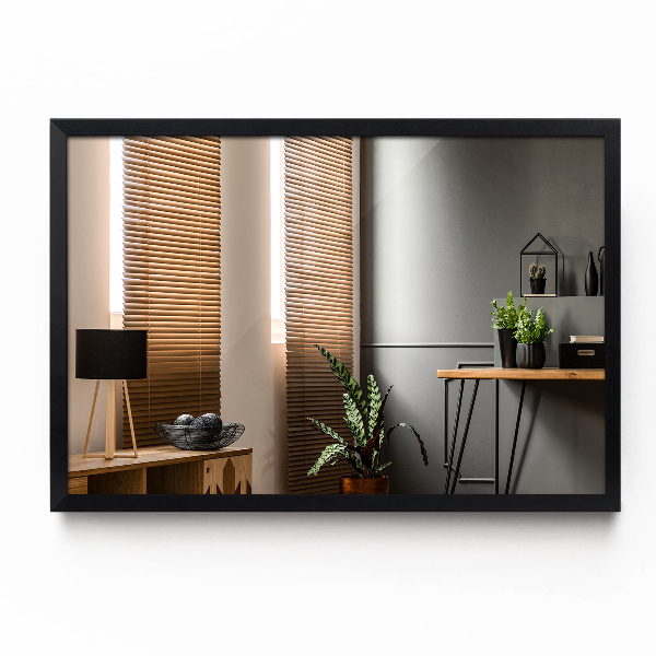Rechthoekige spiegel met een zwart frame voor in de badkamer 80x60 cm