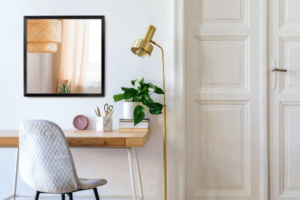 Rechthoekige spiegel met een zwart frame voor in de badkamer 80x60 cm